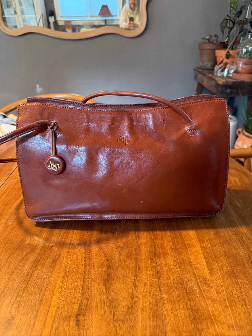 MM Lafleur Cognac Brown Leather Item with Embossed Logo
